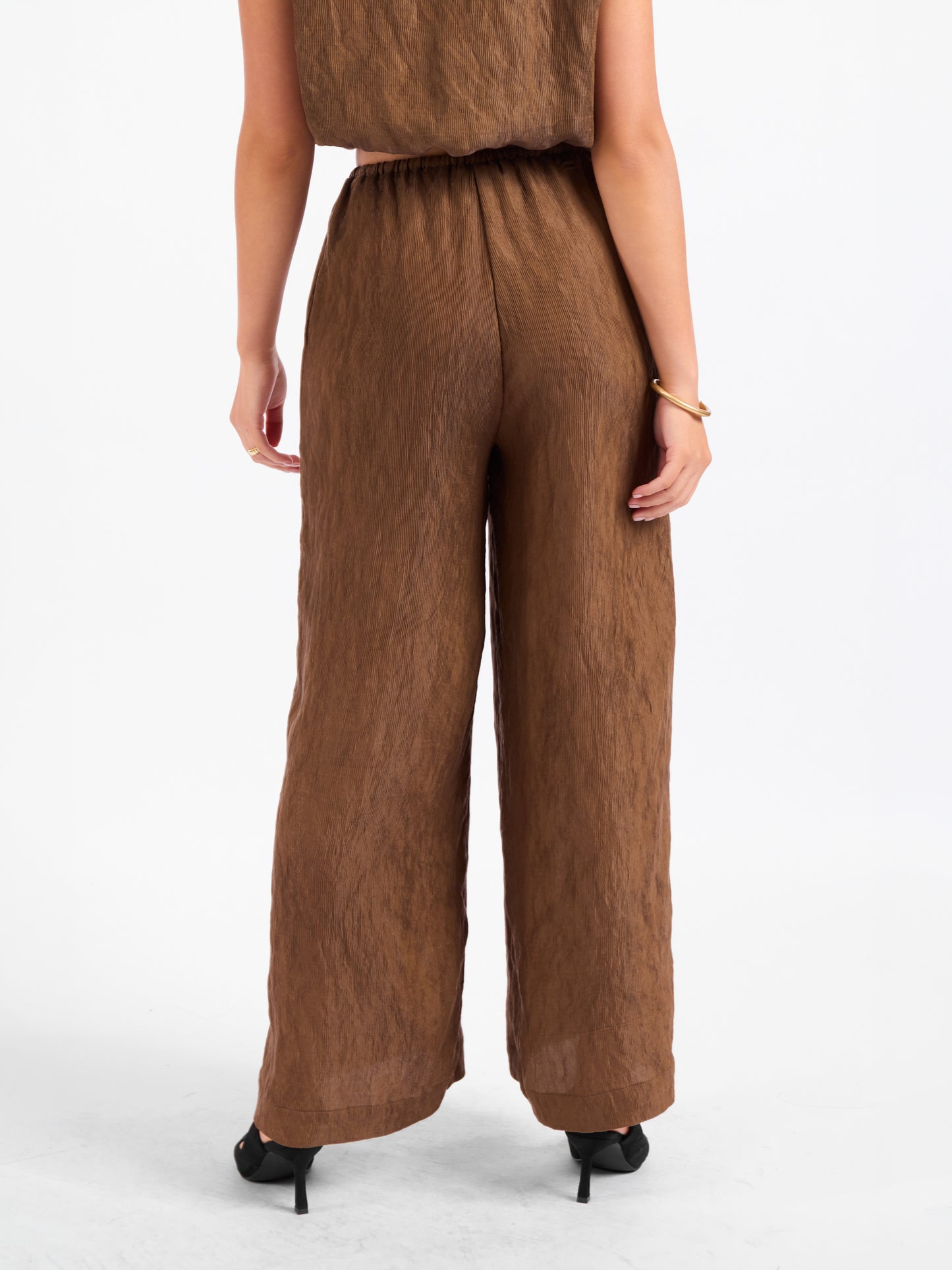Sepia Sky Pants in Bronze Olive - back crop view