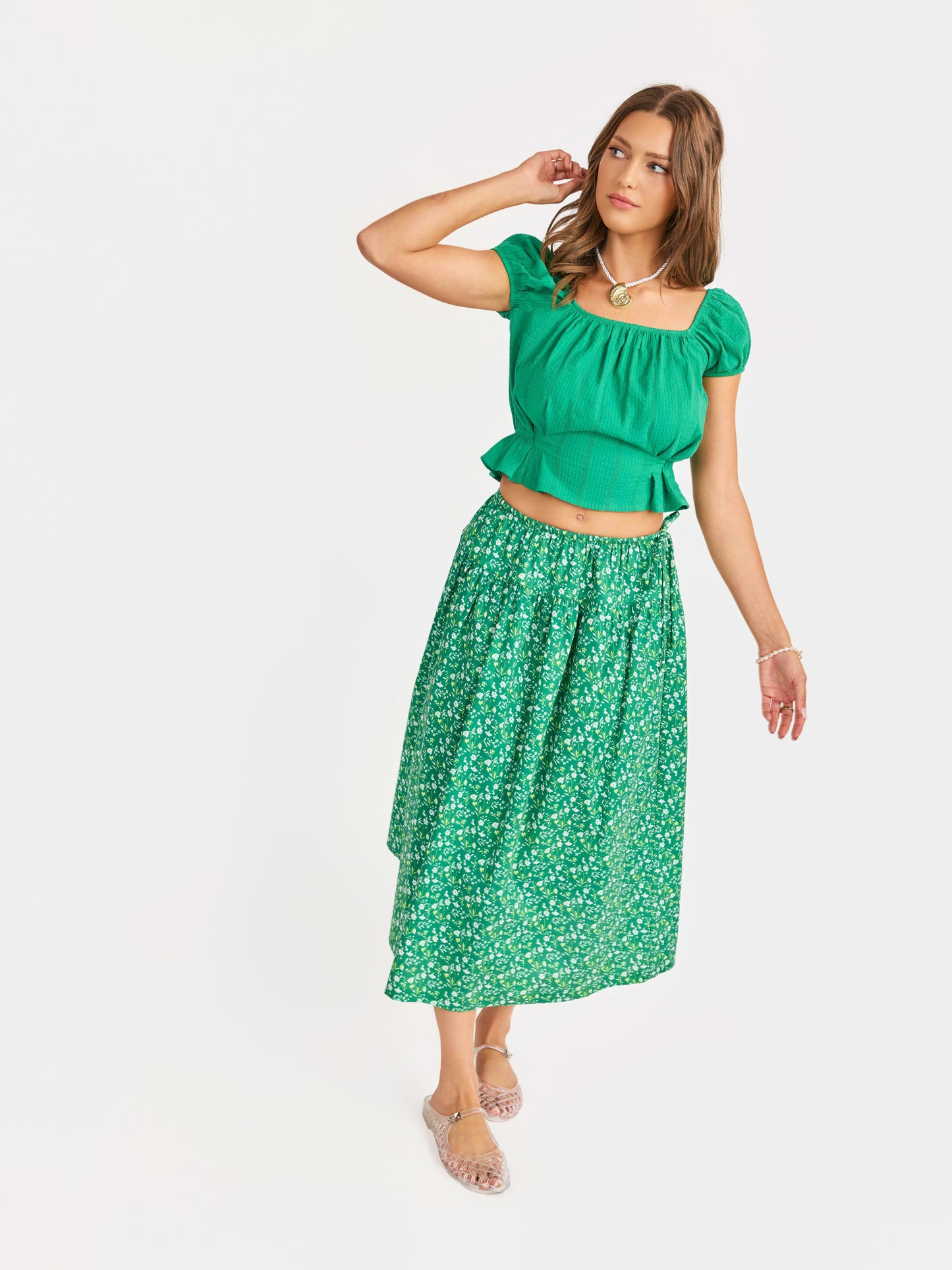 Radiate Cap Sleeved Top in Green - mood image