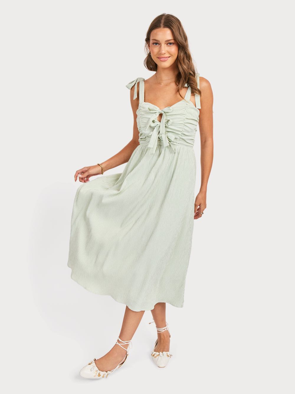 See Me Stripe Bow Midi Dress in Sage Cream - front crop view