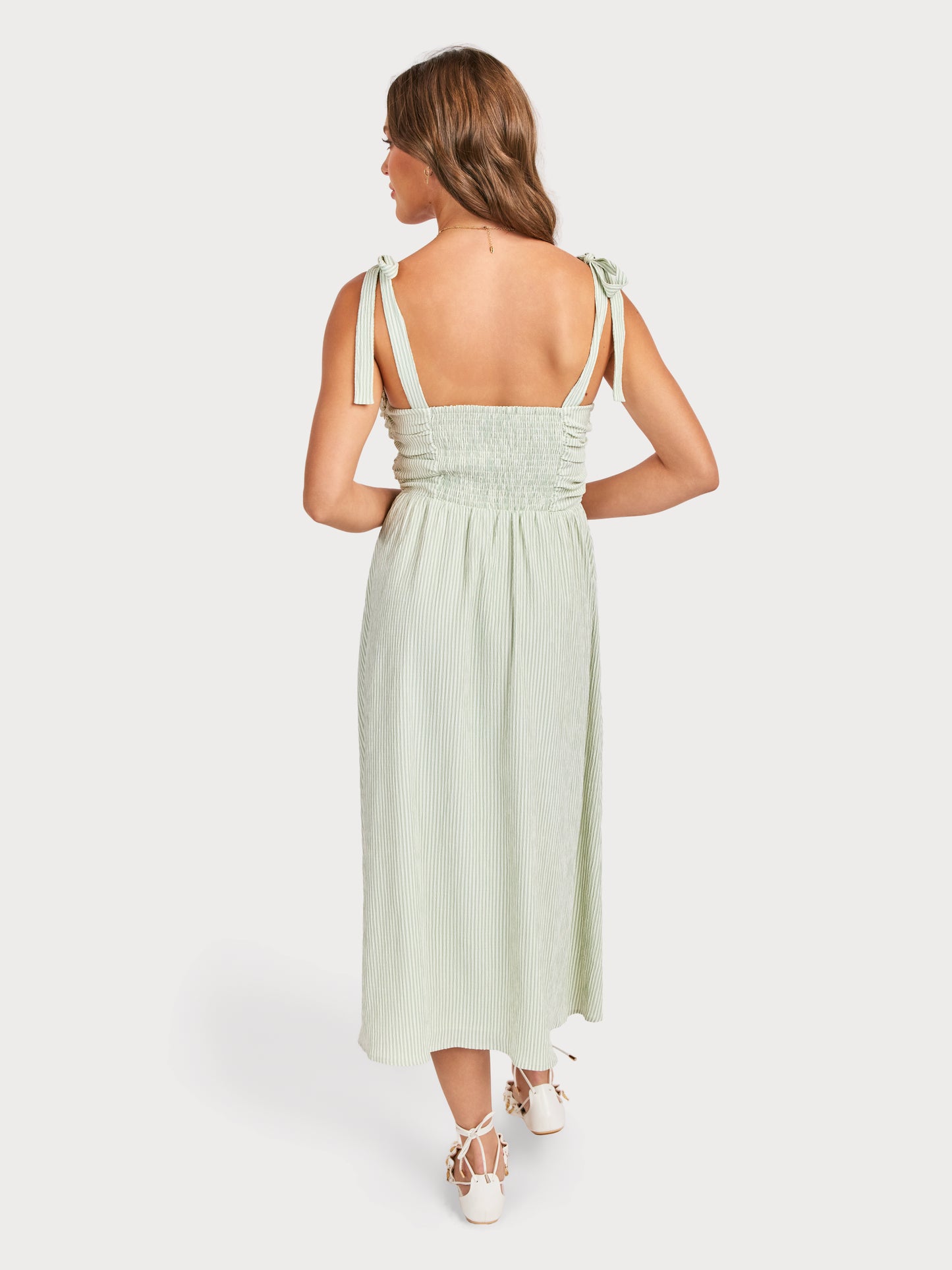 See Me Stripe Bow Midi Dress in Sage Cream - back crop view