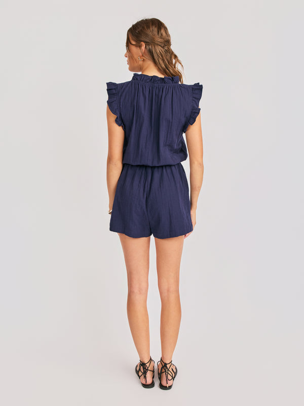Lilah Ruffle Sleeve Romper in Navy - back view