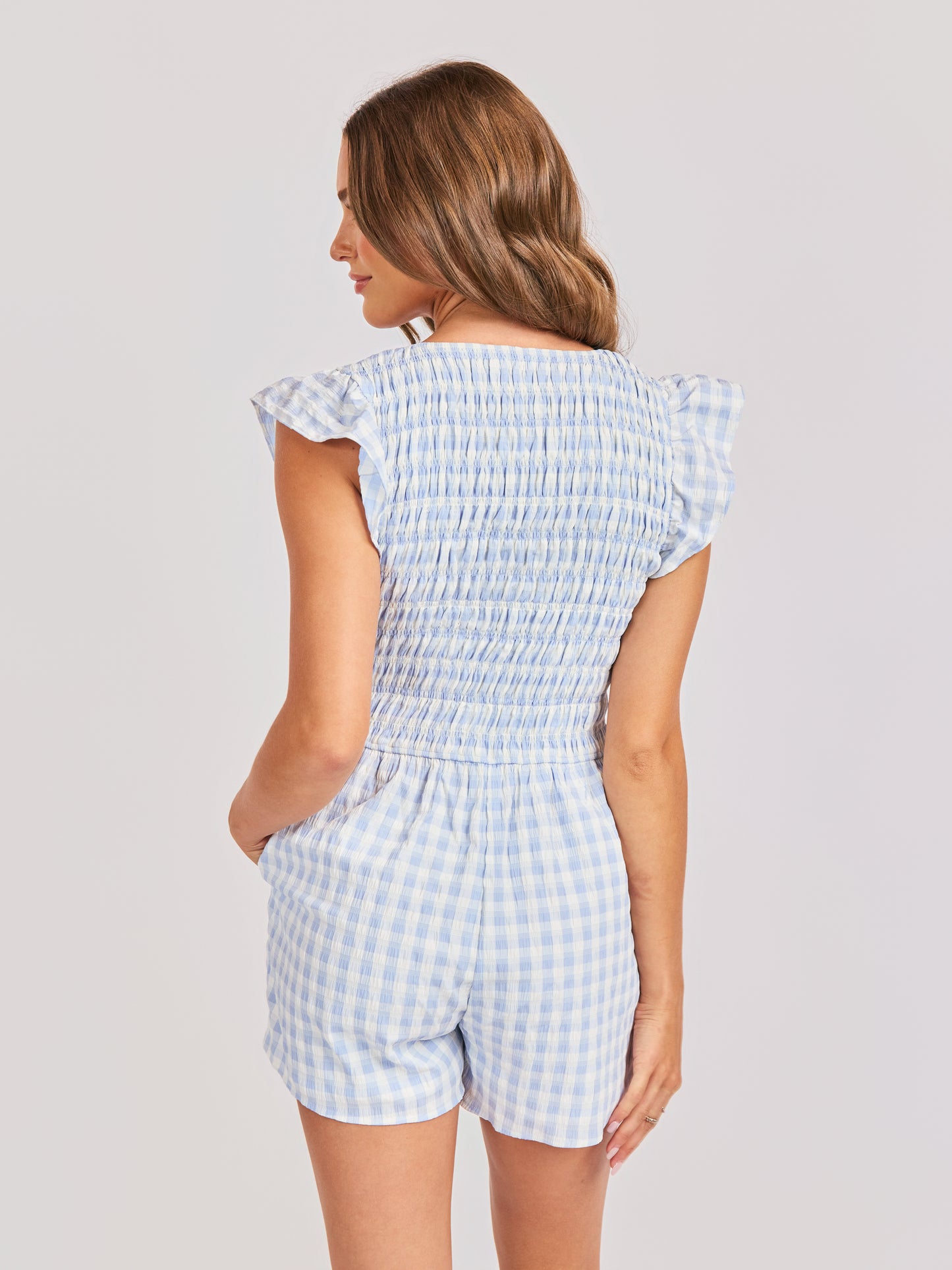 Starlet Gingham Romper in Sky Blue - back crop view