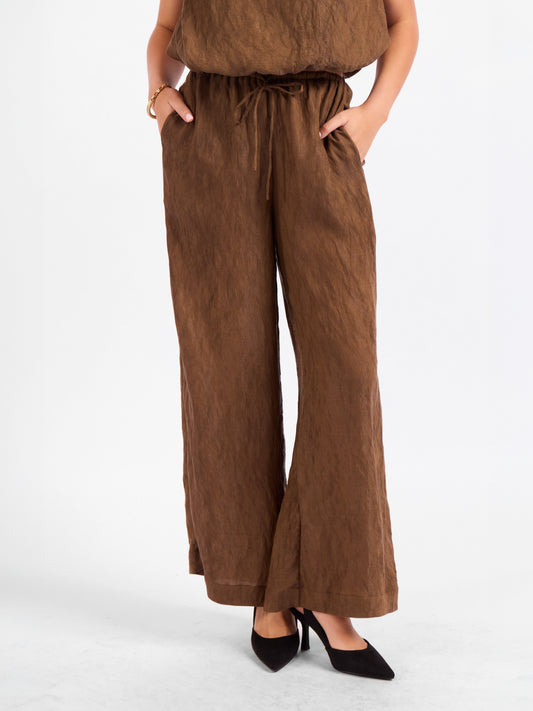 Sepia Sky Pants in Bronze Olive - front crop view